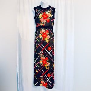 Vintage late 1960s, early 1970s sleeveless maxi dress. Black floral.